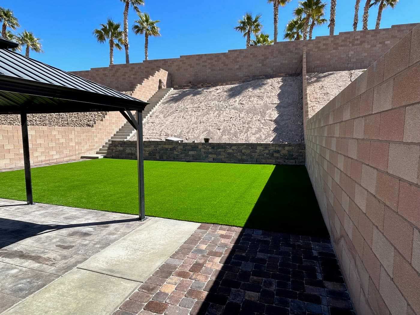 Las Vegas landscaping — artificial turf and paver installation by American Outdoor Living